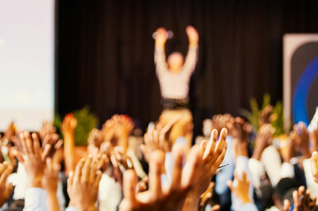 successful presenter on stage