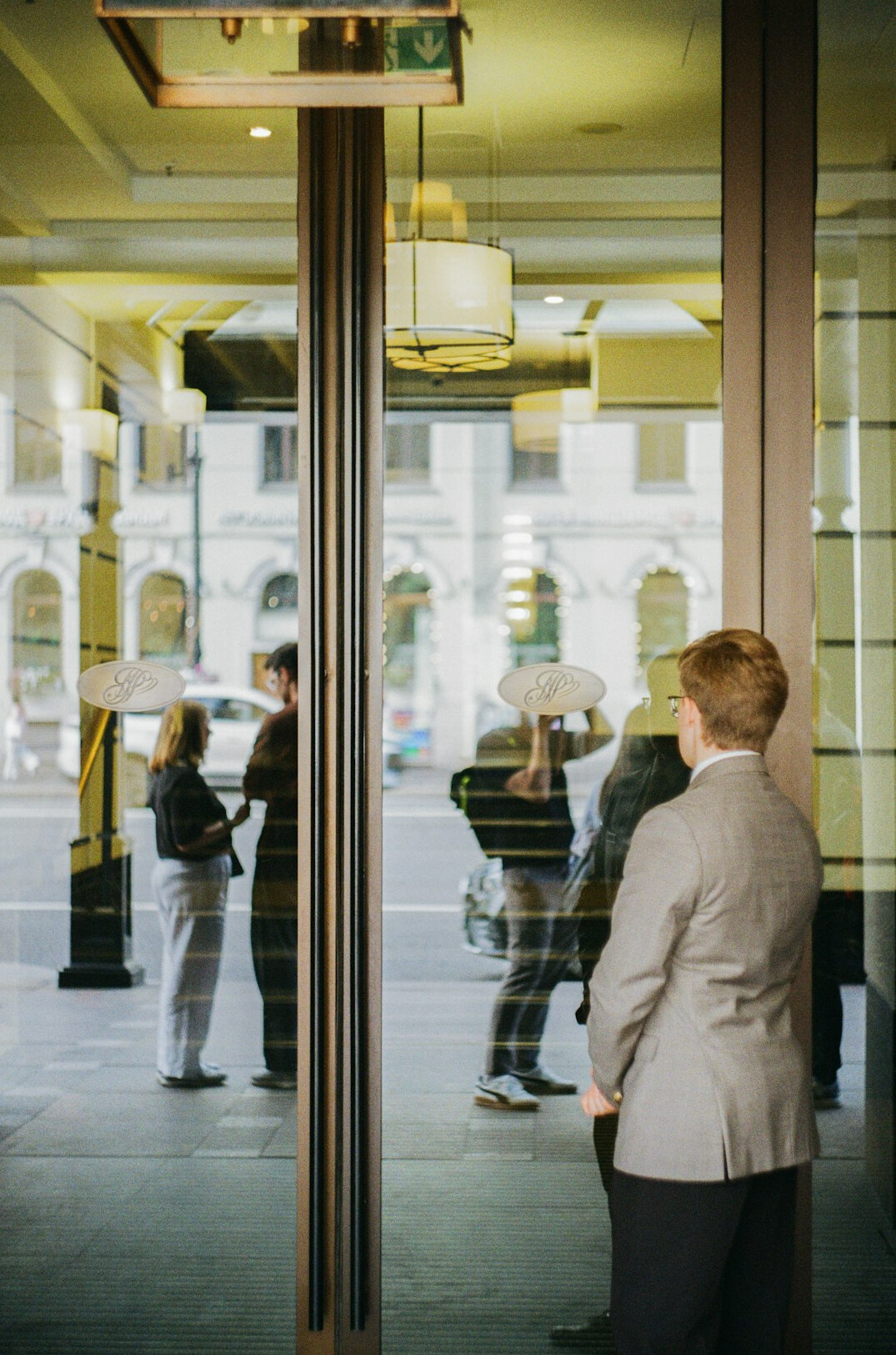 hotel receptionist listening to guest